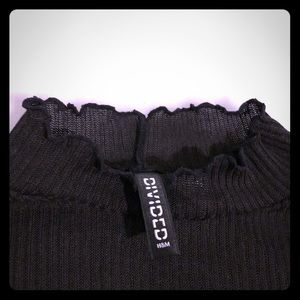 Semi-sheer Ribbed Mockneck with Ruffle Cuff